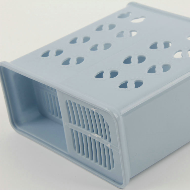 A-Rectangular Two-Compartment Plastic Chopstick Cage With Long Holes At The Bottom